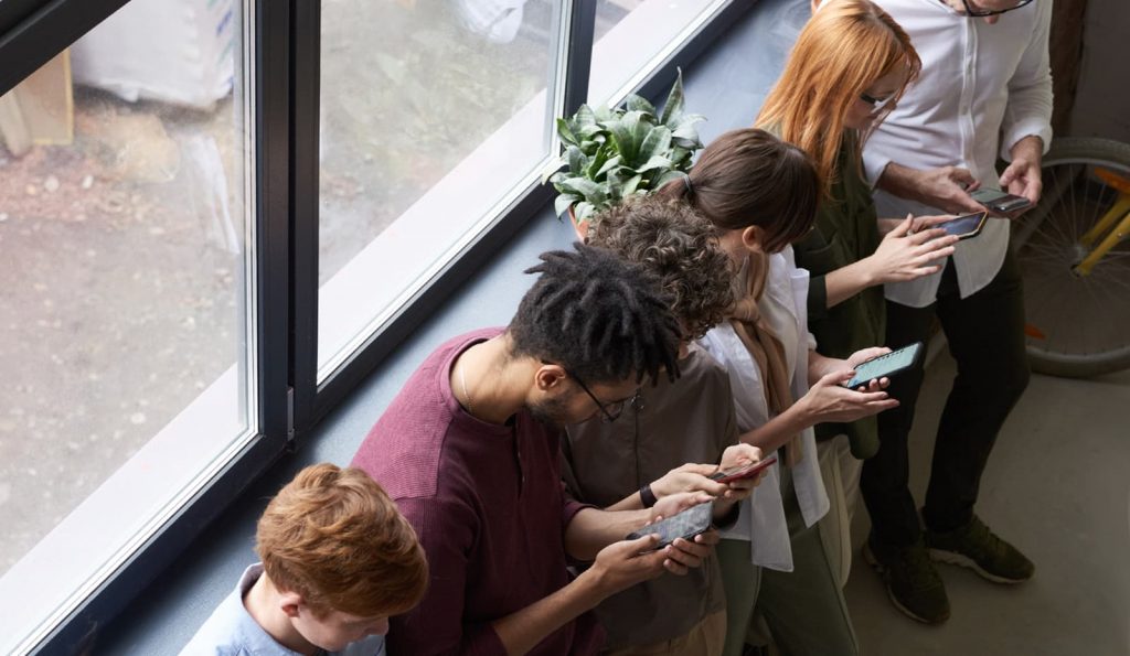 group-of-people-with-phones-engaged-social-media